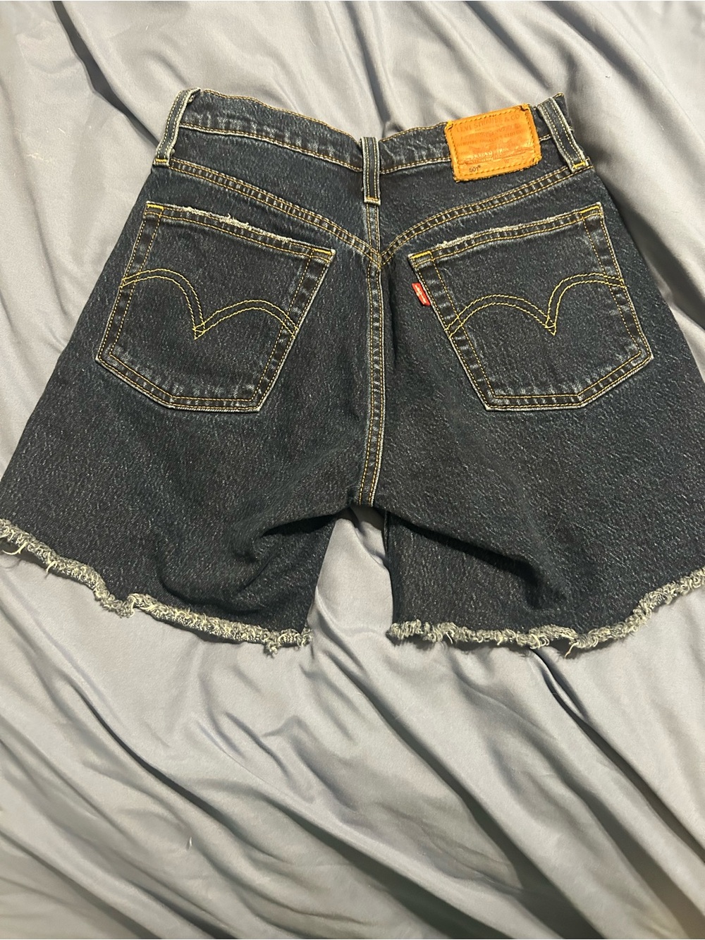 Levi's Blue Denim Cutoff Shorts with Yellow Contrast Stitching